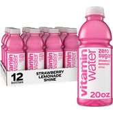 Vitaminwater Shine Strawberry Lemonade Zero Sugar bottle on desk for refreshing hydration and flavor
