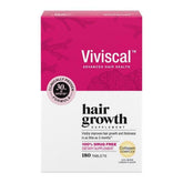 Viviscal hair growth tablets bottle on a clean surface, supporting fuller-looking hair.