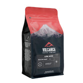 Volcanica Low Acid Coffee bag showcasing smooth, stomach-friendly flavor