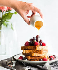Watkins Vanilla alcohol-free flavoring pour shot enables easy drizzle on desserts and drinks.