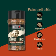 Weber Buffalo Trace seasoning on grill with sizzling meats