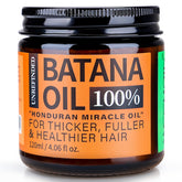 Weemotd Batana oil bottle close-up for scalp nourishment.