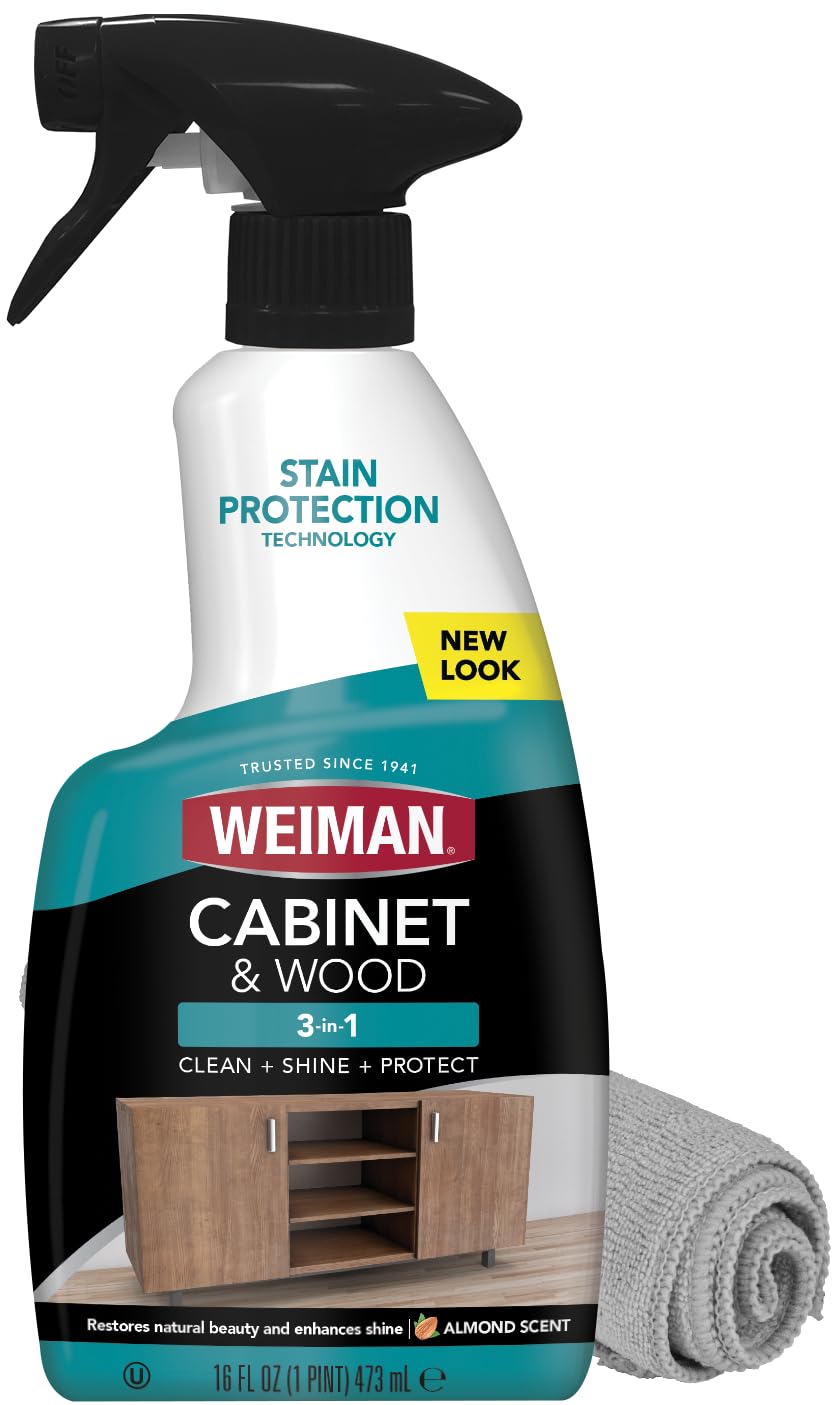 Weiman Cabinet & Wood Clean & Shine bottle applying to cabinets for renewed shine