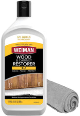 Weiman wood and cabinet restorer 3-in-1 bottle with microfiber cloth for easy cleaning.