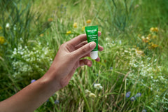Weleda Lip Butter on dry lips providing soothing moisture