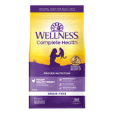 Wellness Complete Health indoor cat kibble close-up with real chicken and turkey.