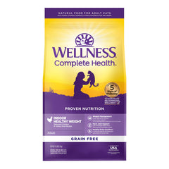 Wellness Complete Health indoor cat kibble close-up with real chicken and turkey.