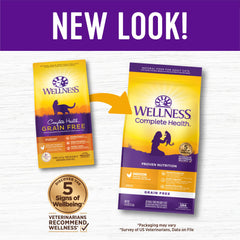 Wellness Complete Health kibble close-up showcases grain-free formula and real chicken protein.
