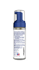 Hands holding Welmedix bottle demonstrate portable cleansing without water