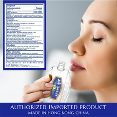 White Flower External Analgesic Balm Oil 10ml on-shoulder application shows targeted joint relief.