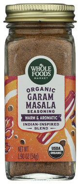 Whole Foods Market garam masala spice jar adds warm Indian flavor to meals.