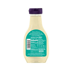 Wholesome Allulose liquid in a glass measuring cup for precise sweetness.