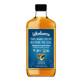 Wholesome Blue Agave Nectar bottle on a kitchen counter, ideal for baking and beverages