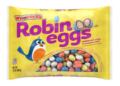 Whoppers Robin Eggs malted center close-up highlighting airy texture.