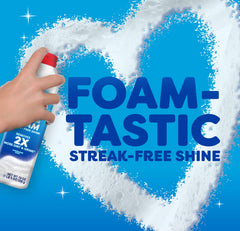 Windex Fast Shine Foam spray nozzle positioned for targeted cleaning on glass.