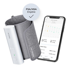 Withings BPM Connect arm cuff reading for at-home measurements.