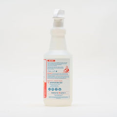 Wondercide indoor pest spray applied to baseboards for targeted protection.
