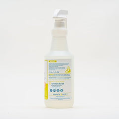 Wondercide spray mist in action, eliminating flying and crawling insects in living spaces.