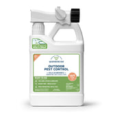 Wondercide Outdoor Pest Control Spray attached to hose for quick backyard protection.