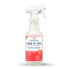 Wondercide Peppermint Flea & Tick Spray bottle ready for on-pet application.