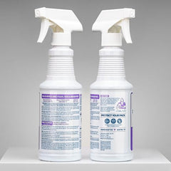 Applying Wondercide Rose spray to a pet's coat for protection.