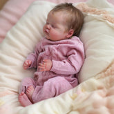 WOOROY Realistic Reborn Baby Doll, 18-inch sleeping girl, weighted body for lifelike cuddles.