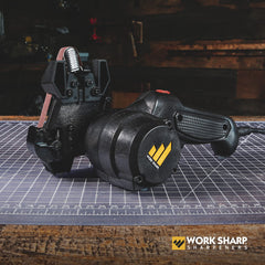 Work Sharp Mk2 tool sharpener in action sharpening rugged tools