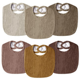 Wrrernsin muslin baby bib front close-up showing soft organic cotton for gentle skin