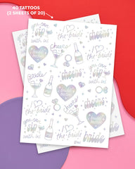 xo Fetti Cheers Bachelorette tattoos featuring iridescent rings for classy bridesmaid favors and moments.
