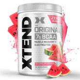Xtend Original BCAA Powder bottle beside a shaker for quick muscle recovery after training.