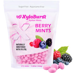 XyloBurst Berry mints pack shown, inviting fresh breath after meals.