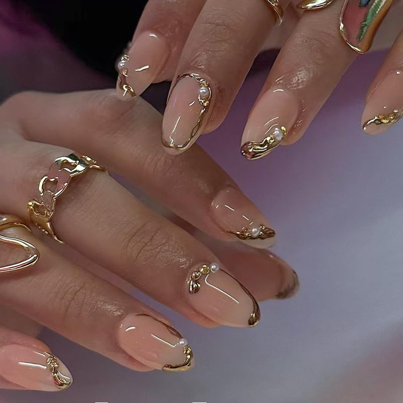 XZMeiLun short almond nails with French tip and 3D gold line charms for elegant at-home manicures.