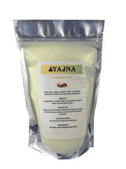 Yajna Organic Raw Mango Butter in a jar showing pure, hydrating skin support.