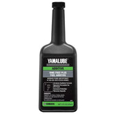 Yamaha Yamalube Ring Free Plus bottle pouring to protect the fuel system and reduce deposits.