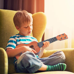 YEZI Classic Ukulele with included pick displayed for easy strumming.