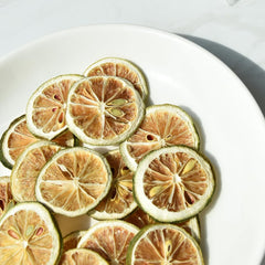 YiLing lime slices used as a decorative cocktail garnish for drinks.