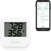 YoLink smart temperature sensor attached to fridge door for real-time monitoring.