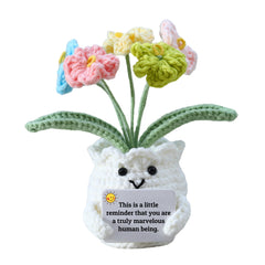 YOOJEE Forget-Me-Not crochet flowers on a desk, adding gentle mood