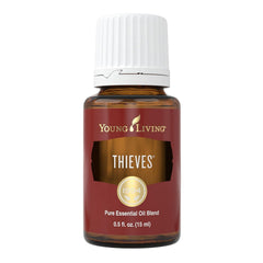 Young Living Thieves essential oil bottle close-up for a spicy, uplifting aroma.