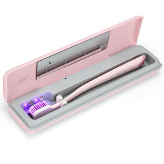 YourMate toothbrush sanitizer case in pink, closed, for on-the-go hygiene.