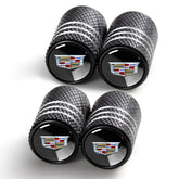 YUIQIEUY tire valve caps close-up with black anodized finish for durable style.