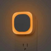 YUNLEX amber night light fits outlets for tidy bedroom illumination and safe navigation.