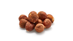 Yupik filberts raw shelled nuts in a bowl ready for topping and snacking.