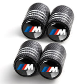 YUIQIEUY tire valve caps in black aluminum with durable anodized finish for BMW and more.