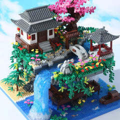 Yushinv cherry bonsai tree house design highlights dramatic suspended architecture.