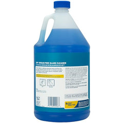 Spray action of Zep Streak-Free Glass Cleaner on a glass surface