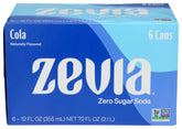 Zevia Zero Calorie Cola bottle on table shows a sugar-free refreshment option.