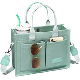 ZHMO canvas tote with laptop compartment keeps 14-inch device safe and organized.