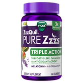 ZzzQuil PURE Zzzs triple action gummies bottle on a nightstand for a calmer sleep routine