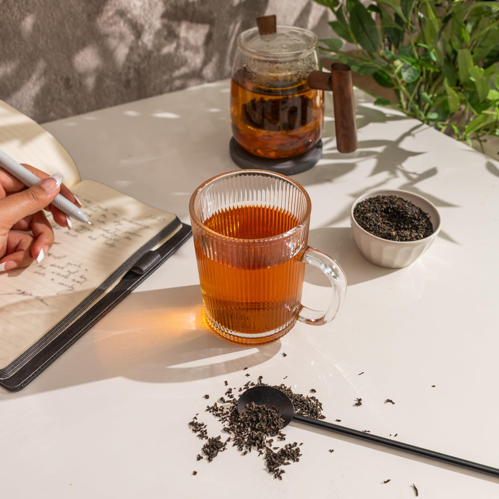 Steaming cup of 20 Leaves Earl Grey for a calm afternoon